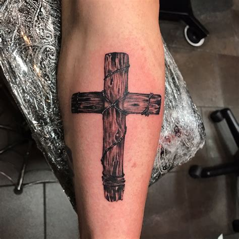 cross rose tattoo meaning|realistic wooden cross tattoo designs.